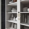 White Sideboard with Glass Doors Displaying Dinnerware Plates Bowls and Decorative Items
