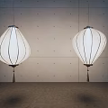 White Lantern Shaped Chandeliers With Striped Design And Tassels Against Gray Wall Interior