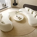 Elegant Plush White Curved Sofa and Coffee Table Set With Round Table Plant And Books