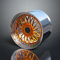 Car Alloy Wheel Featuring Silver Rim Orange Spokes Black Center Cap and Reflective Surface Design