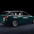 Modern Green Station Wagon With Shiny Exterior And Silver Alloy Wheels