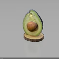 Fresh Ripe Avocado Halved with Visible Seed on Wooden Base Stand