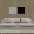 Beige Two Seater Sofa With White And Black Paintings On Wooden Wall And Floor Lamp