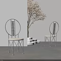 Minimalist Dining Chairs With Black Metal Frame Round Backrest And Light Seat In Indoor Setting