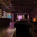 Stylish Modern Bar Interior Design With Neon Lights Comfortable Seating And Bar Counter