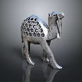 Intricate Metal Camel Sculpture With Hollow Circular Patterns And Detailed Carving