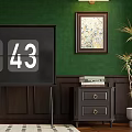 TV With Digital Display In Room With Green Wall And Wood Panels