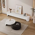 Modern Black And White Round Nested Coffee Table On Beige Rug With TV Stand Decor