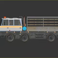 White Blue and Yellow Cargo Truck With Open Bed Metal Railings And Multiple Wheels