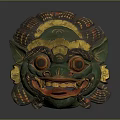 Traditional Green Cultural Mask With Yellow Decorations And Red Eyes Artifact
