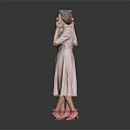 Woman in Pink Dress with Handbag Pink Shoes and Gray Hair Talking on Phone