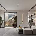 Modern Dining Area With Round Black Table Grey Chairs And Illuminated Display Shelves