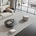 Modern Sofa Coffee Table Set Featuring Beige Sofa Round Table And Striped Rug 3d model