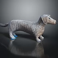 Detailed Woven Gray Dachshund Figurine With Blue Paws On Black Reflective Surface