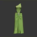 Man Wearing Green Dress with Structured Tailoring and Floral Decorations