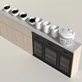 Modern Kitchen With Light Colored Cabinets Gray Countertop Bowls And Rice Cooker