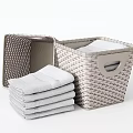 Soft Stacked Bath Towels in Woven Rattan Baskets for Bathroom Storage