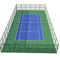 Outdoor Tennis Court With Green Surface And Blue Playing Area Surrounded By Green Fence