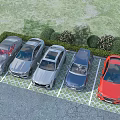 Various Colored Cars Parked in Outdoor Parking Area With Green Grass and Bushes