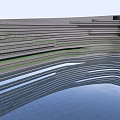 Architectural Feature Wall With Layered Texture Green Strips And Water Reflection
