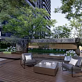 Elegant Landscape Wall Design With Trees Stone Seats And Water Feature In Courtyard