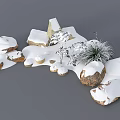 Winter Yard Garden With Snow Covered Stones And Small Pine Plants