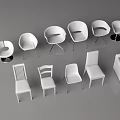 White Furniture Display Featuring Different Chair Styles And Modern Sofa