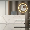 Modern Reception Desk With Marble Countertop Wooden Slat Wall And Circular Light Fixture