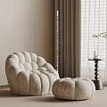 Plush Beige Modern Lounge Chair With Footstool And Green Plant In Neutral Interior