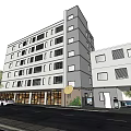Modern Multi Storey Building With Glass Facade Trees And Evening Sky View