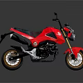 Red Sporty Modern Motorcycle With Black Seat And Sleek Alloy Wheels Design
