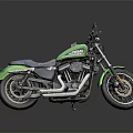 Green Cruiser Motorcycle With Black Seat Chrome Exhaust And Alloy Wheels On Dark Reflective Surface