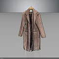 Long Plaid Pattern Coat Hanging On Wooden Hanger With Red Brown Checks