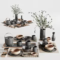 Ceramic Tea Set With Gray Brown Teapot Cups Bowls On Bamboo Mats And Green Plants