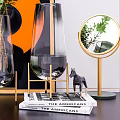 Glass Vase With Green Plants And Modern Decor Elements Including Painting Candle Holder And Mirror