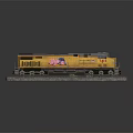 Yellow Union Pacific Train Model With American Flag On Railroad Track Number 745