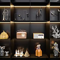 Modern Ornament Decor Combination With Various Sculptures Radios And Animal Figurines On Black Shelves With Lighting