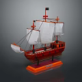Decorative Wooden Sailboat Model with White Sails Red Hull Black Flag on Orange Base