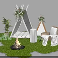 Outdoor Camping Setting with White Tepee Flower Arrangements Bonfire and Chair on Green Grass