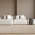 Beige Sectional Sofa With White Cushions Gray Throw And Beige Rug On Wooden Walls