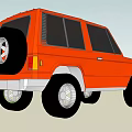 Orange Vintage SUV With Black Windows Silver Bumper And Alloy Wheels