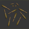 Golden Metallic Bullets Scattered On Dark Background With Multiple Shapes And Angles