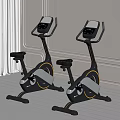 Indoor Stationary Exercise Bikes on Wooden Floor with Light Colored Walls