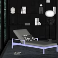 Modern Gray Chaise Lounge with Geometric Pillow near Black Bookshelf and Floor Lamp in Natural Light