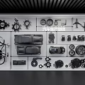 Automotive Manufacturing Display Wall Showcasing Car Models Gears Bicycle And Mechanical Parts