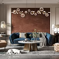 Modern Living Room With Blue Sofa Spherical Chandelier Beige Armchair And Coffee Table