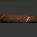 Golden Brown Ring Shaped Pastry With Textured Surface And White Cream Filling