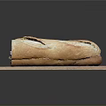 Fresh Long Loaf Bread On Wooden Cutting Board With Golden Crust