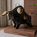 Black And Gold Bull Sculpture With Circular Hollow Design On Wooden Base And Potted Plant