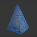 Ancient Egyptian Pyramid Sculpture With Intricate Carved Hieroglyphs And Symbols